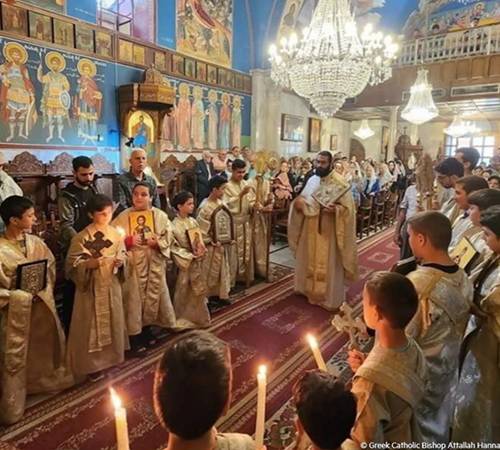 Gaza’s tiny Christian community huddles in churches to hide from war 